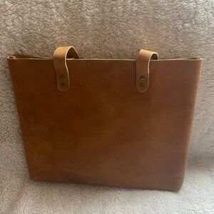 Genuine leather tote bag. Brand new without tags. Beautiful!